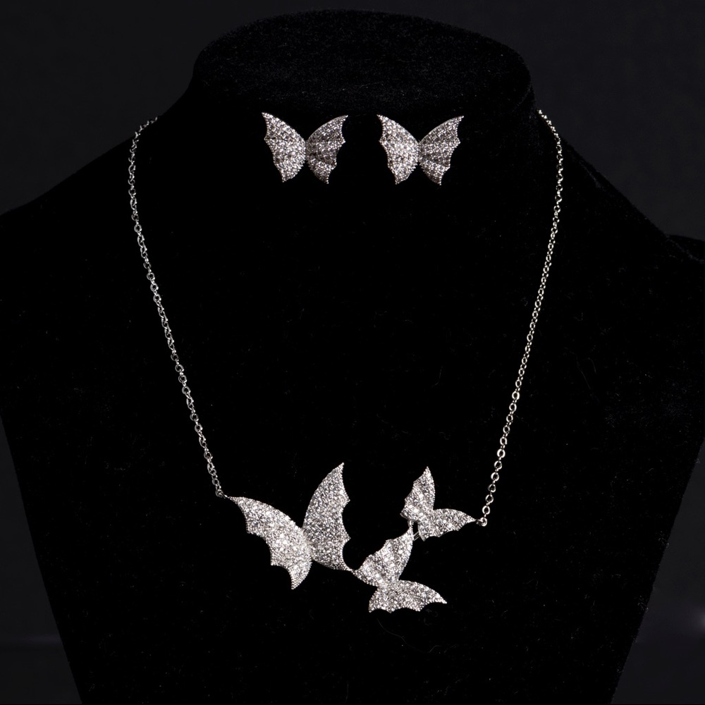 Butterfly necklace and earrings.